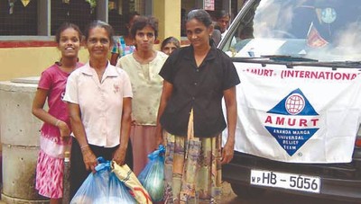 Emergency aid, construction of temporary housing, ... Image 5